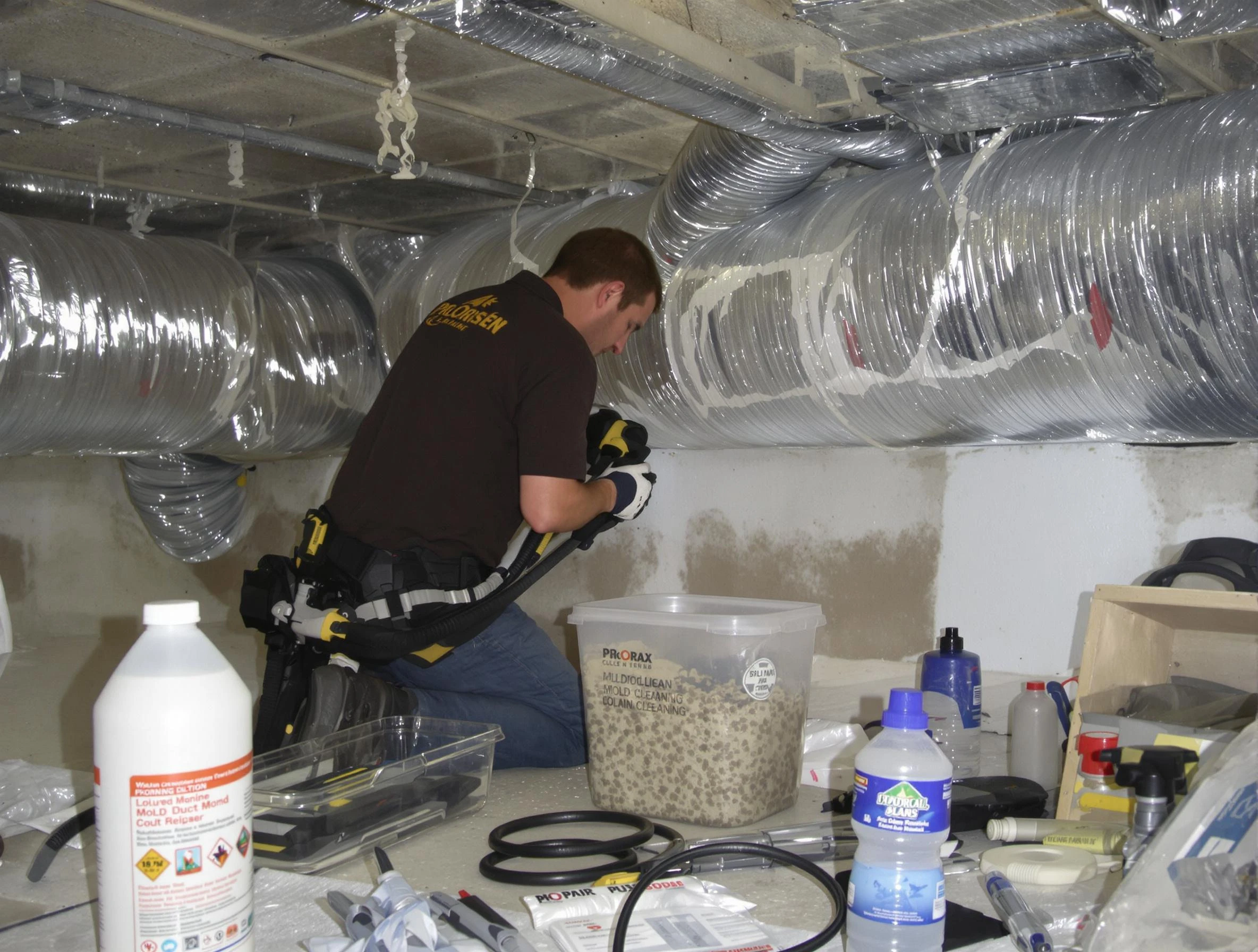 Newton Air Duct Cleaning specialist performing professional mold removal from air ducts in Newton